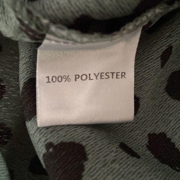 Green and Black Animal Print Blouse with puff sleeves and elastic Ruffle Cuffs. - Picture 3 of 7